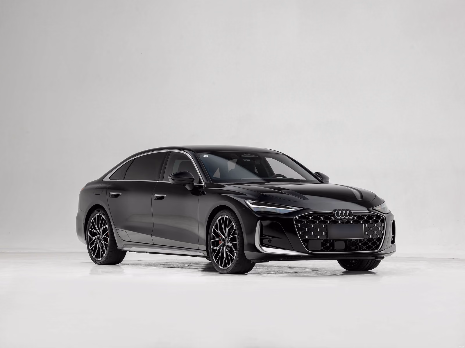 Audi A6L 3.0T quattro — передняя часть чёрного кузова