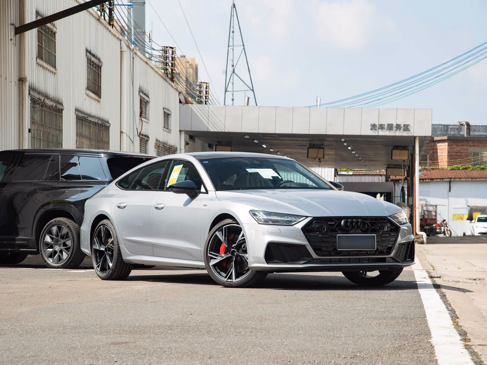 Audi A7 Sportback — передняя часть с противоположной стороны