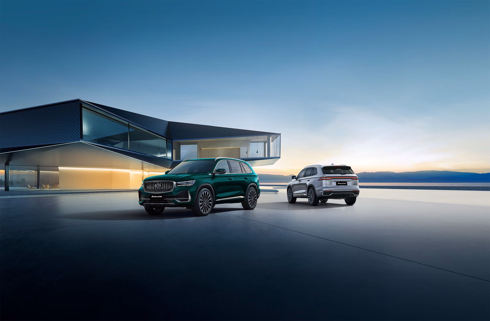 Два Geely Monjaro у современного здания