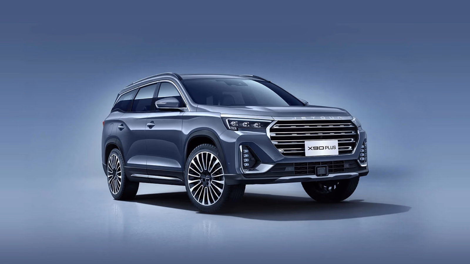 Jetour X90 Plus в студии, вид спереди в три четверти