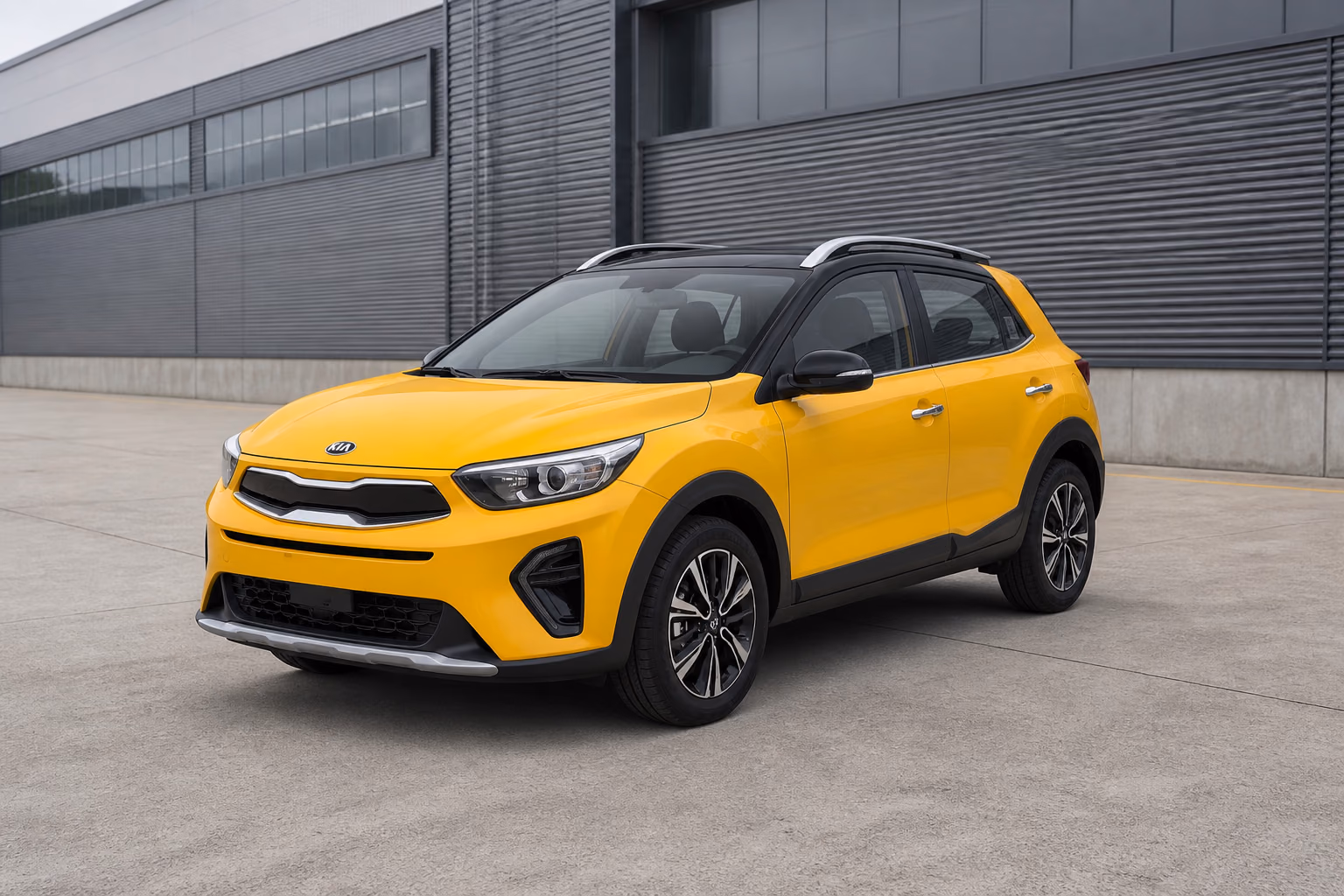 Жёлтый Kia KX1 у нейтрального складского здания