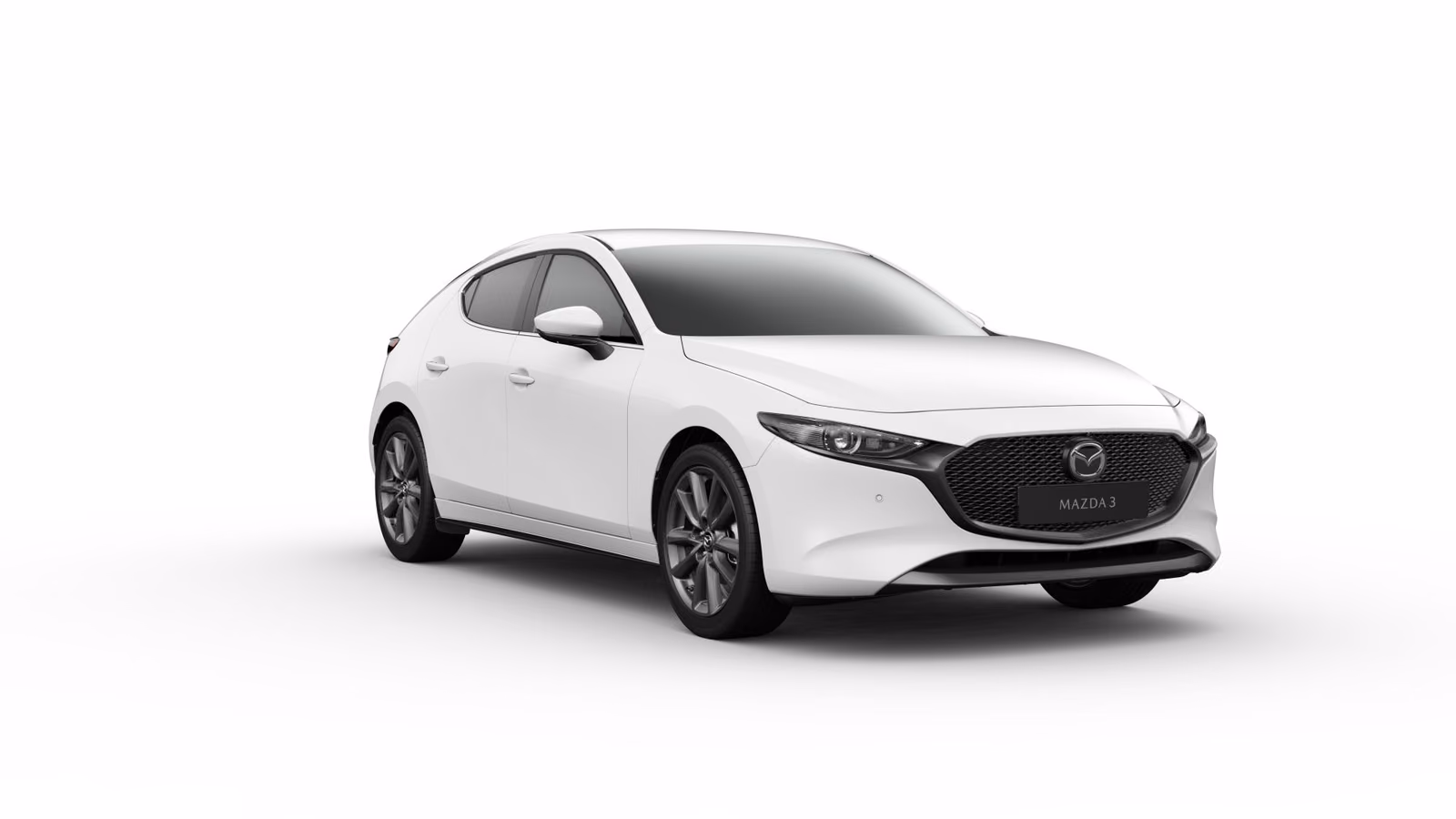 Mazda 3 в студии, вид спереди сбоку