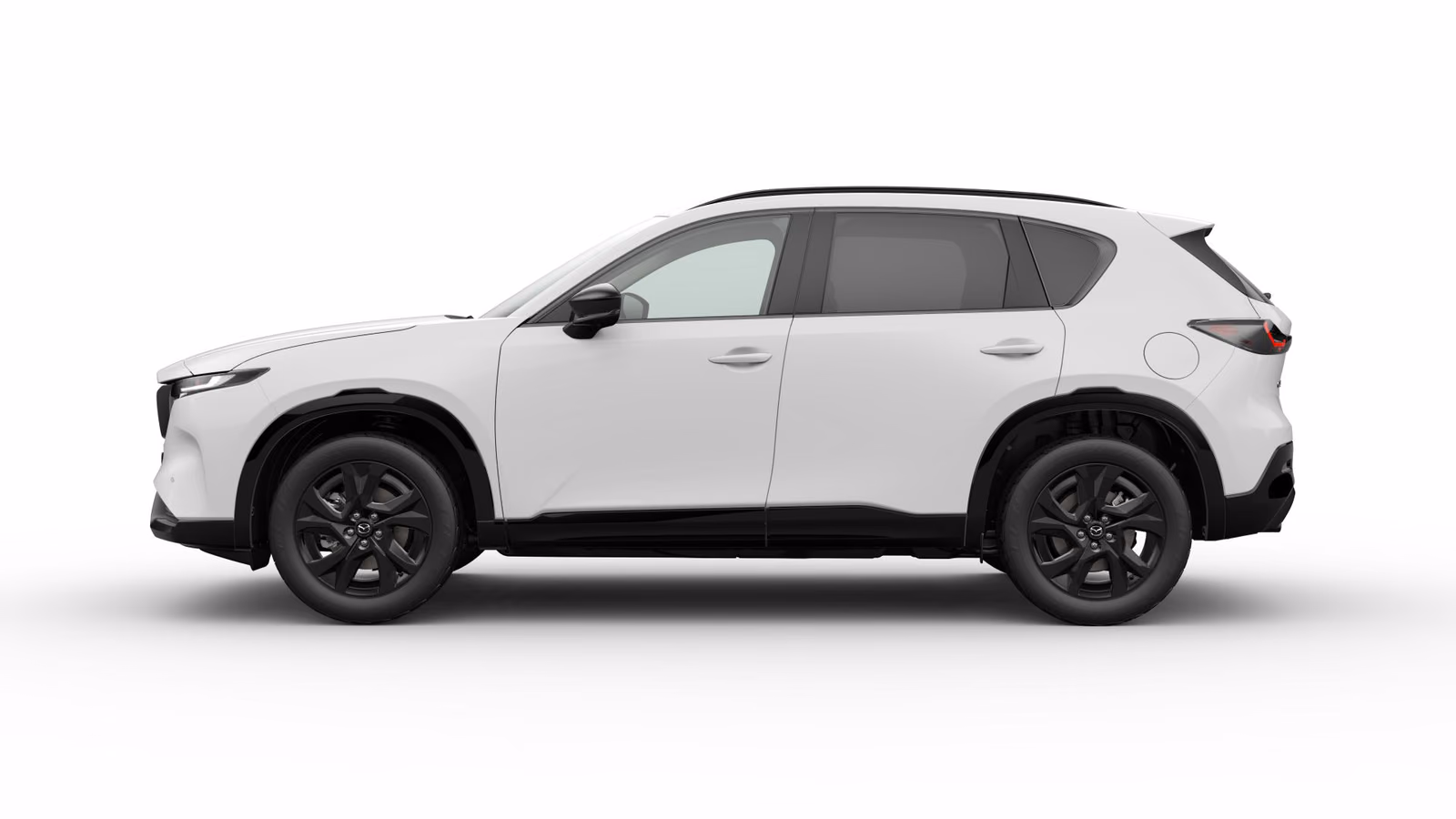Mazda CX-5 в белом кузове, профиль слева