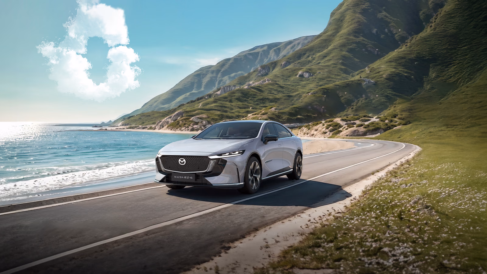 Mazda EZ-6 на прибрежном шоссе
