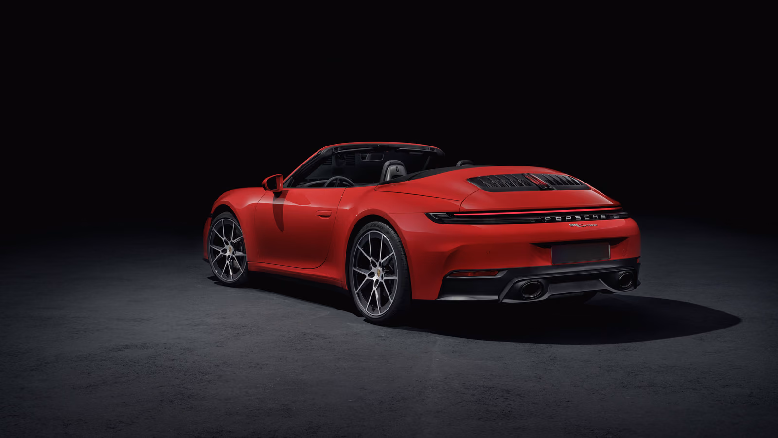 Porsche 911 кабриолет сзади в студии
