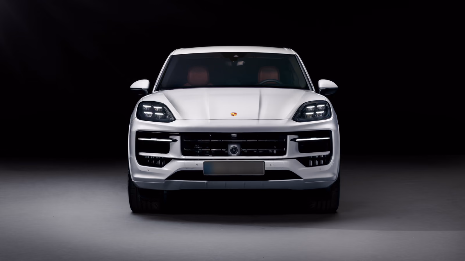 Porsche Cayenne 2024, вид строго спереди