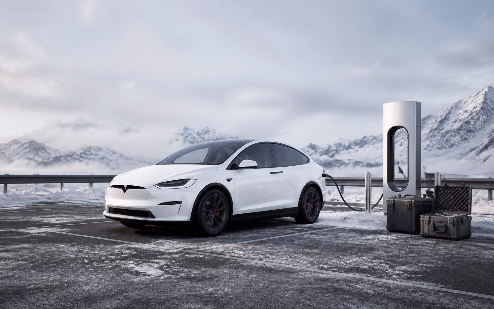 Белая Tesla Model X на зимней зарядной станции