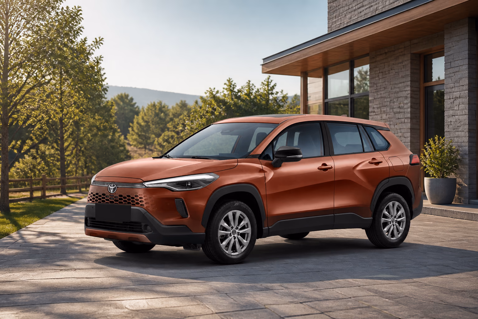 Медная Toyota Corolla Cross у современного загородного дома