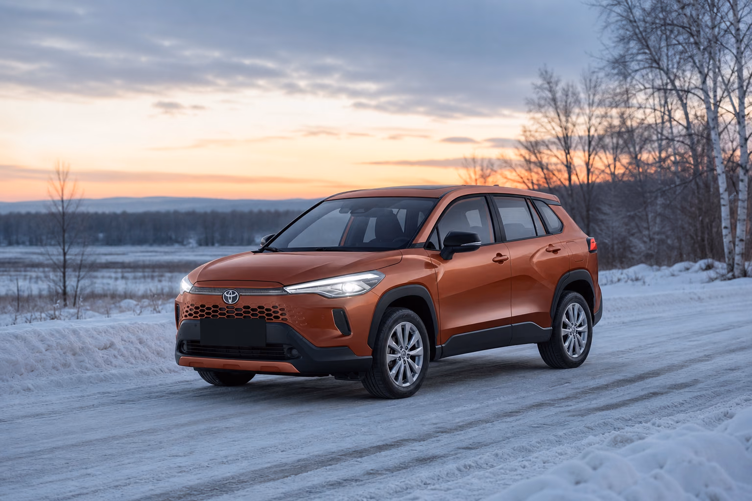 Медная Toyota Corolla Cross на пустой зимней дороге