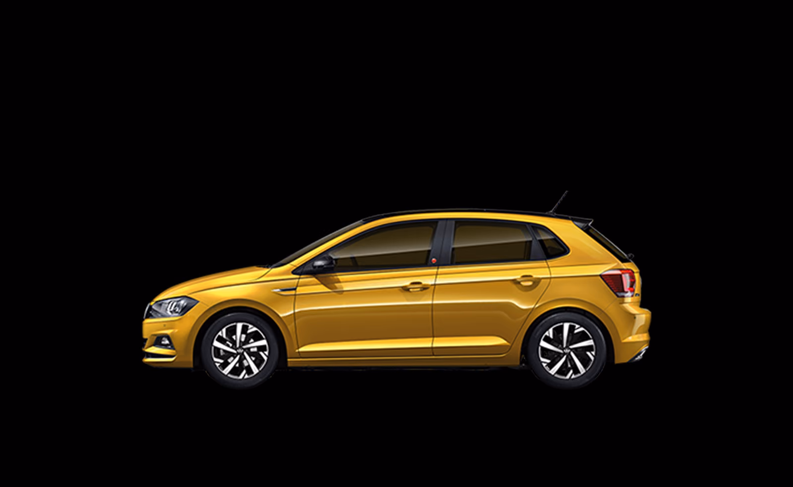 Жёлтый Volkswagen Polo Plus в студии, вид сбоку